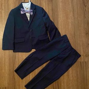 Boys navy blue suit/ pants jacket/ dress shirt/ bowtie and suspenders included